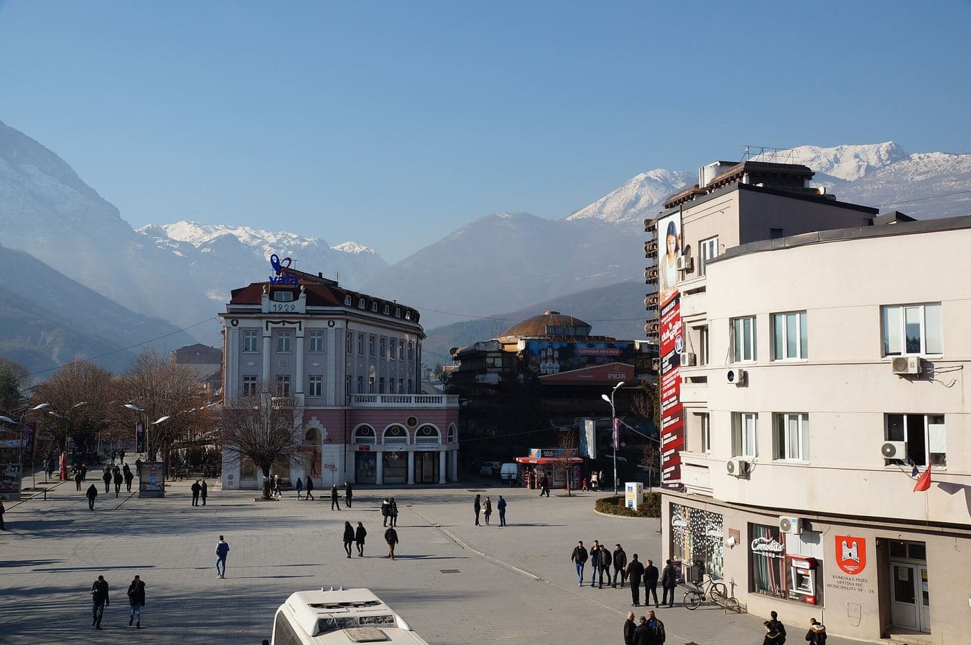 The city center of Peja and Rugova mountains in winter