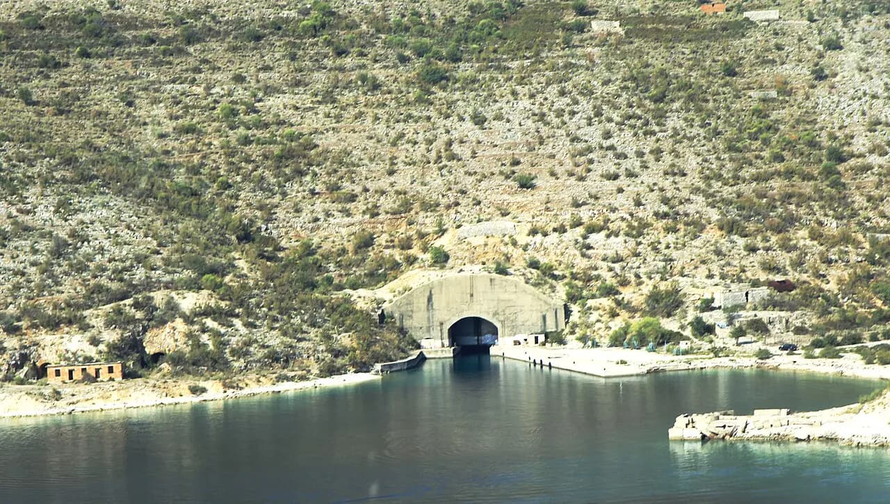 The entrance into old, not used port for one of army submarine from China production Porto Palermo Tunnel near of Porto Palermo, Albania, September 2018