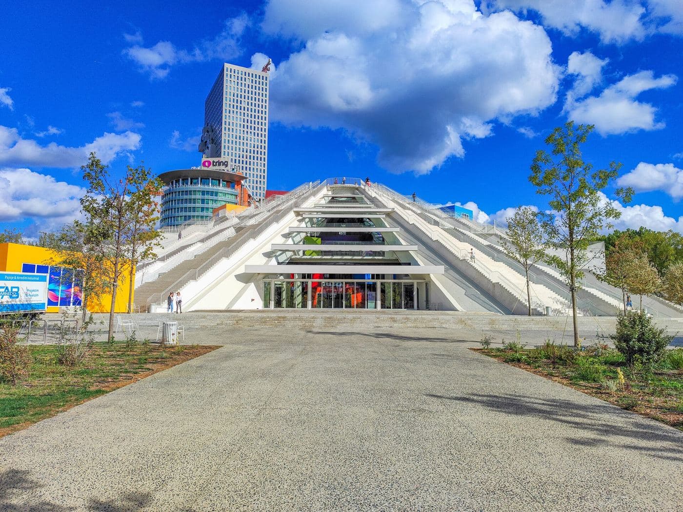 Pyramid of Tirana, with European Trade Center and Downtown One in the background.